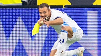 Israel forward Sayed Abu Farhi was sent off for this goal celebration where he appeared to mimick using a gun. AFP