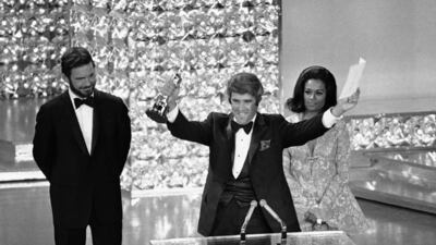 Bacharach accepts the Oscar for Best Original Score for Butch Cassidy and the Sundance Kid at the Academy Awards in Los Angeles on April 7, 1970. AP