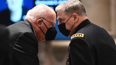 Gen Mark Milley, Chairman of the Joint Chiefs of Staff, speaks with Patrick Leahy, a US senator, as they arrive for the funeral service. AFP