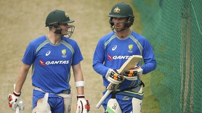 Steve Smith, left, of Australia speaks with teammate Glenn Maxwell during a nets session ahead of their WT20 match against Pakistan on March 24, 2016 in Chandigarh, India. (Photo by Ryan Pierse/Getty Images)