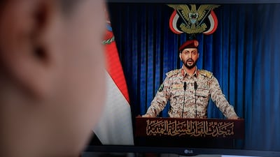 Houthi military spokesman Brig Gen Yahya Saree on a TV screen in Sanaa, Yemen. EPA