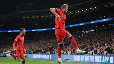 Harry Kane celebrates after scoring the third. Getty