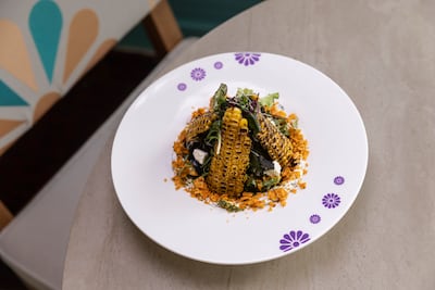 Sweetcorn tossed with local herbs and a tangy dressing at Kashtat Amina. Antonie Robertson / The National