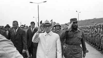Fidel Castro reviews troops during his visit to Leuna in the former German Democratic Republic in June 1972. With Castro is East German president Erich Honecker. Rogelio More / Prensa Latina via AP Images