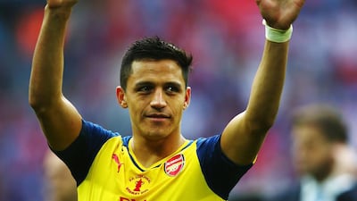 Alexis Sanchez shown after Arsenal won the FA Cup final against Aston Villa in May. Clive Rose / Getty Images / May 30, 2015