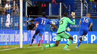 Didier Drogba wheels away in celebration after scoring for the Montreal Impact against Chicago Fire. Jean-Yves Ahern / USA Today