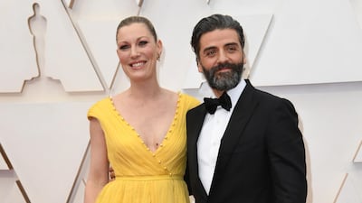Elvira Lind and Oscar Isaac arrive at the Oscars on Sunday, February 9, 2020, at the Dolby Theatre in Los Angeles. AP