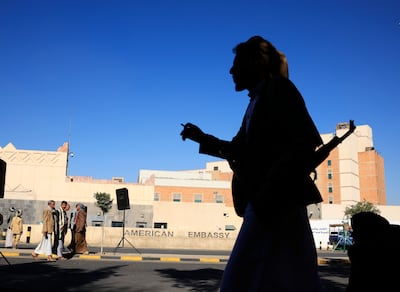 Houthi supporters gather for a rally marking the 10th anniversary of the closure of the US embassy in Sanaa. EPA