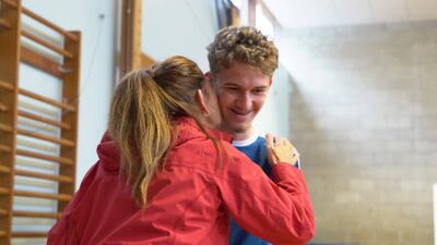 Well done. A pupil at Fowey River Academy, Cornwall, receives his GCSE results.