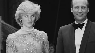 Diana, Princess of Wales, wearing Jan van Velden, with Crown Prince Harald of Norway at a performance by the London City Ballet in Oslo, Norway, on February 13, 1984. Getty Images