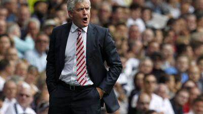 Stoke City manager Mark Hughes shouts instructions at his team during a Premier League match in August. Ian Kington / AFP / August 15, 2015