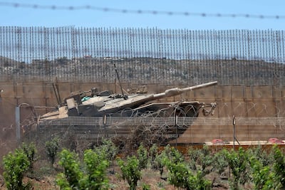 An Israeli tank positioned along the border with Lebanon. AFP