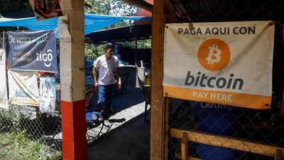 Bitcoin banners are seen outside of a small restaurant at El Zonte Beach in Chiltiupan, El Salvador. Reuters