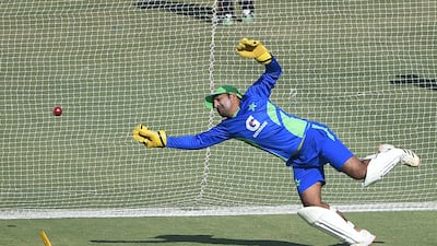 Pakistan's Sarfaraz Ahmed takes a catch during training ahead of the first Test against New Zealand at the National Stadium in Karachi. AFP