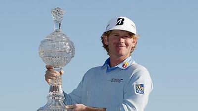 Brandt Snedeker poses with the trophy after winning the AT&T Pebble Beach National Pro-Am.
