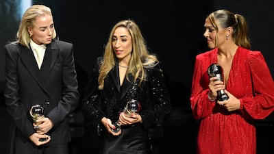 Alex Greenwood, Olga Carmona and Mary Earps, with their awards after being named in the the Fifpro Women's World XI. Getty