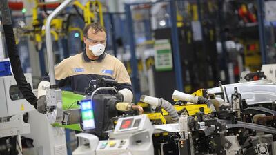A Maserati assembly staff member works at the Maserati car plant in Grugliasco. Giorgio Perottino / Reuters