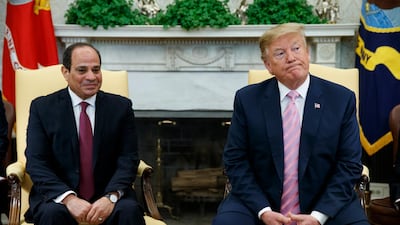 US President Donald Trump with Egyptian President Abdel Fattah El Sisi in the Oval Office in April. Mr Trump has offered to intervene to break the deadlock with Ethiopia over its construction of a massive upstream Nile dam. Evan Vucci / AP