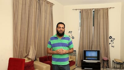 Discovery Gardens resident Ahmed Jelani has been fighting his landlord over the constant pressure to vacate and now says he must send his family home to Pakistan as he is being forced to move out. Pawan Singh / The National