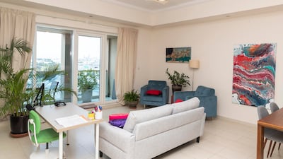 The living room area and the balcony