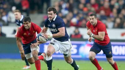 Alex Dunbar, centre, of Scotland breaks with the ball during the RBS Six Nations match between France and Scotland at Stade de France on February 7, 2015 in Paris, France. The two teams meet again on Sunday. (Photo by David Rogers/Getty Images)