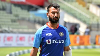 India's Cheteshwar Pujara walks to bat in the nets during a training session ahead of the 5th Test at Edgbaston. AP