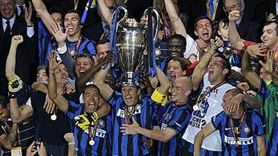 Inter's jubilant players celebrate with the European Cup after beating Bayern Munich in Madrid.
