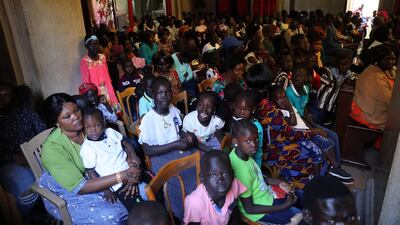Christians attend a Christmas Mass at St. Matthew's Cathedral Church.