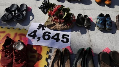 Shoes are displayed at the Capitol to pay tribute to Hurricane Maria's victims in San Juan, Puerto Rico. Alvin Baez / Reuters