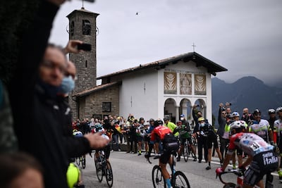 Cyclists pass the Shrine of Madonna del Ghisallo during the Tour of Lombardy. AFP