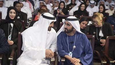 Sheikh Mohammed bin Rashid, Vice-President and Ruler of Dubai, exchanges a word with Sheikh Mohammed bin Zayed, Crown Prince of Abu Dhabi and Deputy Supreme Commander of the Armed Forces, at the World Government Summit. Hamad Al Kaabi / Crown Prince Court - Abu Dhabi