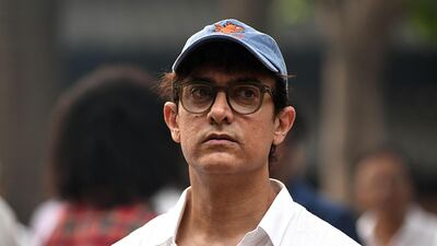 Actor Aamir Khan attends the funeral of Krishna Raj Kapoor. AFP
