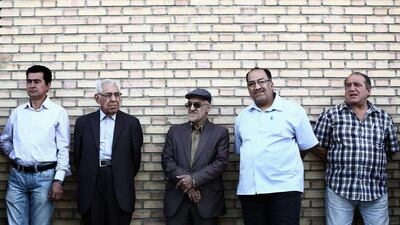 Iraqi men residing in Iran line up to vote for Iraq’s parliamentary elections at a polling station in southern Tehran. Behrouz Mehri / AFP Photo