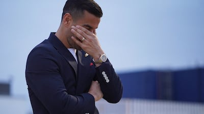 Iran's Ehsan Hajsafi gets emotional as he arrives ahead of the World Cup. Reuters