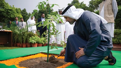 Sheikh Khaled planted tree saplings at Raj Ghat memorial in New Delhi. Photo: Abu Dhabi Media Office