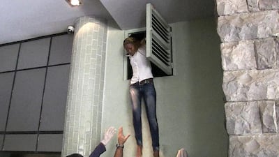 A woman hid in an air vent during the attack. AFP