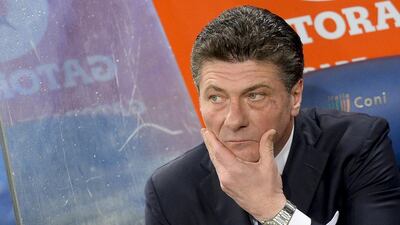 Inter Milan coach Walter Mazzarri looks on before the Serie A match against Roma on March 1, 2014, at Rome's Olympic stadium. Andreas Solaro / AFP