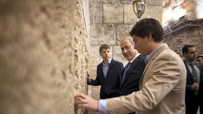 Israeli prime minister Benjamin Netanyahu, with his sons Yair, left, and Avner. Uriel Sinai / AP