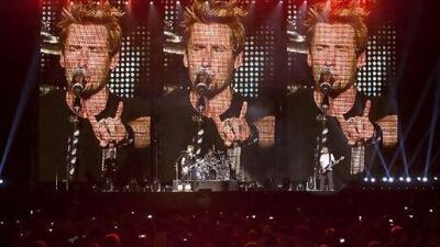 Candian rockers Nickelback have fans on their feet for the entire performance at du Arena on Yas Island last night, at the second After-Race concert. Antonie Robertson / The National