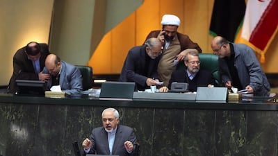 Iranian Foreign Minister Javad Zarif (bottom) addresses his parliament to explain and justify last week’s nuclear deal in Geneva. Abedin Taherkenareh / EPA