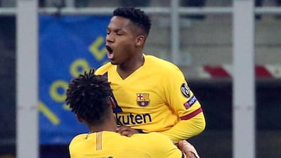 Fati with his teammate Jean Clair Todibo. EPA