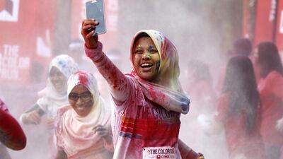 What does excessive use of selfies on social media say about our psychological state? Photo: Lai Seng Sin / AP