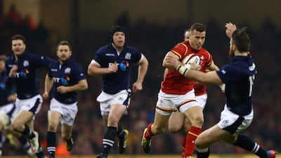 Gareth Davies and Wales, in red, were able to find space to run when they needed to against Scotland at Cardiff. Michael Steele / Getty Images