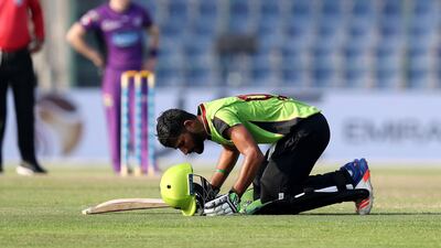 Mohammad Faizan of Lahore Qalanders after scoring his half century.