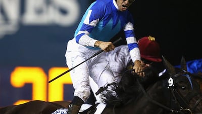Joao Moreira riding Vivlos, left, wins the Dubai Turf. Francois Nel / Getty Images