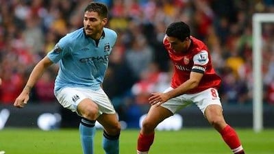 Javi Garcia realises it is difficult to get into the Spanish side but is confident his stay in Manchester will help him achieve that goal.