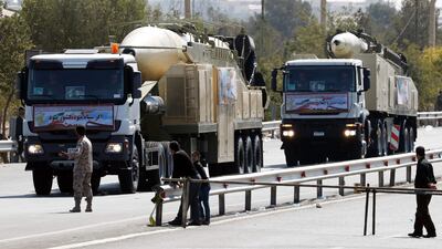 Iran's president Rouhani vowed that Iran would boost its ballistic missile capabilities despite criticism from the United States and France. STR/ AFP