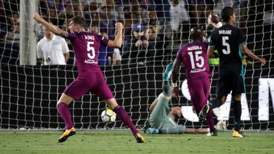 Manchester City's John Stones celebrates a goal by Nicolas Otamendi. Jae C Hong / AP Photo