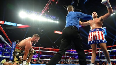 Handout photo provided by Mikey Williams/Top Rank of Tyson Fury knocking down Germany’s Tom Schwarz at the MGM Grand in Las Vegas. PA Wire