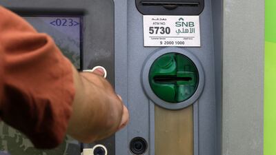A Saudi National Bank ATM in Riyadh. Lenders in the kingdom are benefitting from a sustained economic momentum in the Arab world's biggest economy. AFP